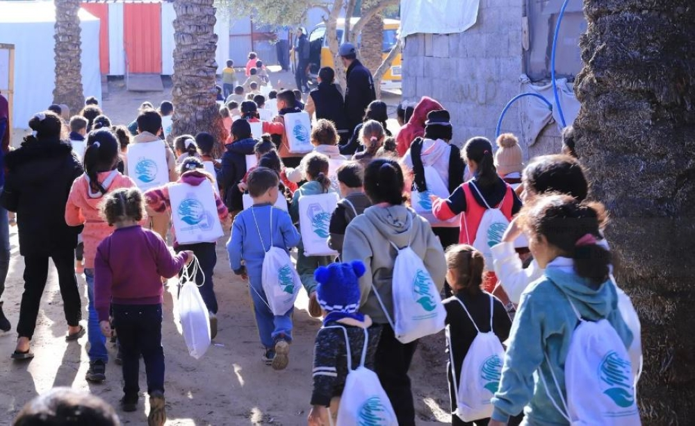 توزيع ملابس شتوية على أطفال غزة - مركز الملك سلمان للإغاثة