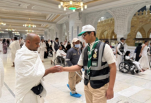The Scout Bash... Saudi Scouts serve the pilgrims with a smile